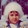 Liz in a fluffy snow  hat