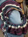 Carol's knitting a scarf